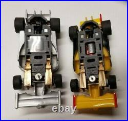 4 AFX 164 cars with track pieces GT40 Mega G, Highway Patrol, 2 of F1