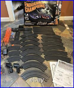 AFX Slot Car Set 21042 Endurance Champions with 2 Cars Complete W Box & Manuals