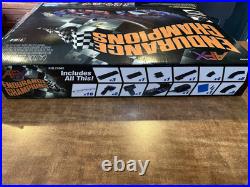 AFX Slot Car Set 21042 Endurance Champions with 2 Cars Complete W Box & Manuals