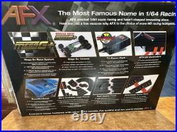 AFX Slot Car Set 21042 Endurance Champions with 2 Cars Complete W Box & Manuals