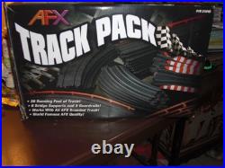 AFX Slot Car Track Pack 26 Ft. Open Box + 2 Cars And 2 Controllers Never Used
