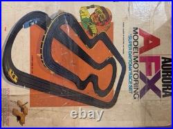 AFX Super Daytona Raceset Vtg 1980s ho slot car track + 2 controllers
