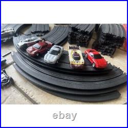 AFX/Tomy Racemasters 4-Way Split Electric Slot Car Set 8 Cars, Track & Box