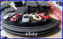 AFX/Tomy Racemasters 4-Way Split Electric Slot Car Set 8 Cars, Track & Box