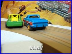 Aurora AFX Devil's Ditch Performance Track Slot Car Set Tomy Jurassic Park Truck