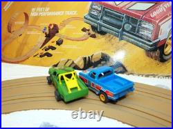 Aurora AFX Devil's Ditch Performance Track Slot Car Set Tomy Jurassic Park Truck