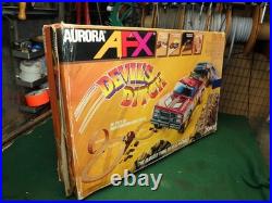 Aurora AFX Devil's Ditch Performance Track Slot Car Set Tomy Jurassic Park Truck