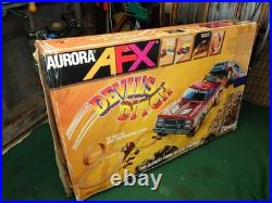 Aurora AFX Devil's Ditch Performance Track Slot Car Set Tomy Jurassic Park Truck