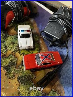 AutoWorld The Dukes Of Hazzard Curve Huggers Electric Racing Slot Car used