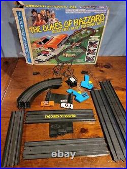 Dukes Of Hazzard Slot Car Set in Original Box with 2 slot cars complete track