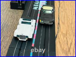 Miami Vice slot track with cars. Track and cars only. Fits Tyco AFX LL