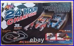 TOMY AFX Model 70286 24 HOUR CHAMPIONS Vintage Slot Car Set