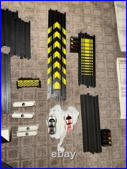 TYCO Daredevil Cliff Hangers Slot Car Race Track Set Complete with2 Corvettes + Ex TYCO Daredevil Cliff Hangers Slot Car Race Track Set Complete with2 Corvettes + Ex