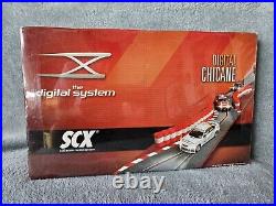 The digital system SCX Digital Chicane 132 scale racing system (25130) SEALED