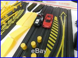 Tyco Race and Chase with u-turn cars and double cross jump