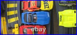 Tyco Slot Car Track, 2 Controllers, 2 Power Packs 8 Cars & 53 Pcs Track