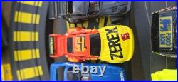 Tyco Slot Car Track, 2 Controllers, 2 Power Packs 8 Cars & 53 Pcs Track