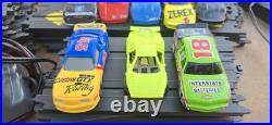 Tyco Slot Car Track, 2 Controllers, 2 Power Packs 8 Cars & 53 Pcs Track