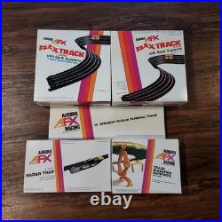 Vintage Aurora AFX slot car collection with race tracks & controls