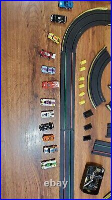 Vintage Mario Andretti Aurora AFX slot car track set with race cars box manuals